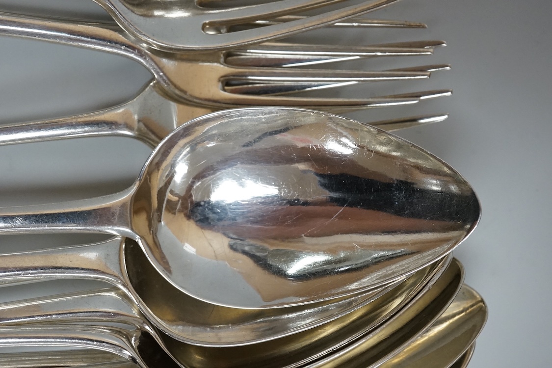 A harlequin part canteen of 19th century Old English pattern flatware, comprising thirty items, all with engraved crest, various dates and makers, 38.1oz.